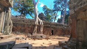 Mysterious Ancient ruins Ta Prohm temple - famous Cambodian landmark, Angkor Wat complex of temples. Siem Reap, Cambodia.
