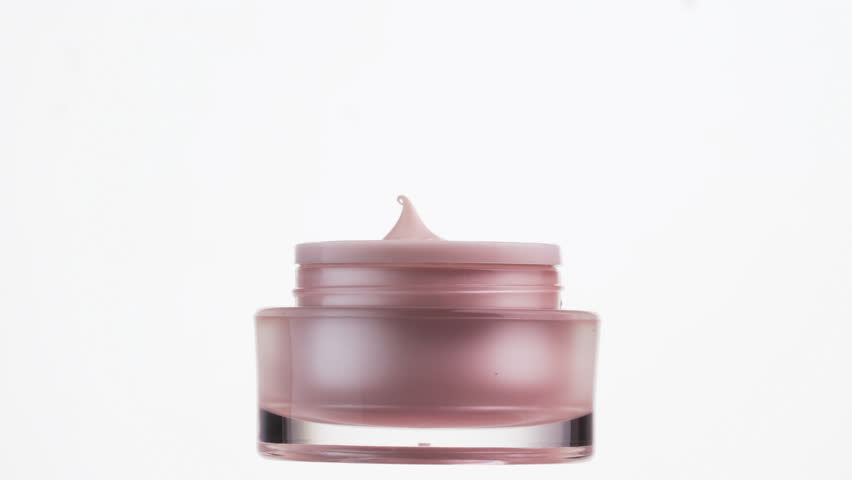 Closeup shot of cosmetics cream with rotate on white background.
 | Shutterstock HD Video #1101517869