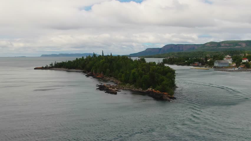 Aerial view of small Island of evergreens on Lake Superior Ontario Sleeping Giant Silver Islet