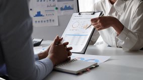 Meeting business people brainstorm to analyze charts in business finance report, financial and investment account planning. Discuss the analysis of the market growth situation and the company's sales. - Powered by Shutterstock - Get 15% off with code: PIKWIZARD15
