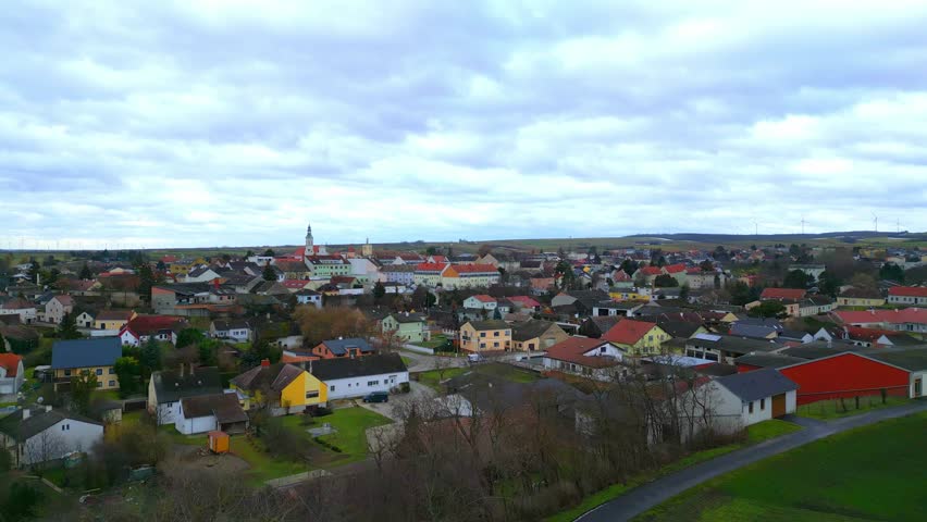 Flying Above Houses In The Town Of Zistersdorf In Austrian State Of Lower Austria. wide aerial