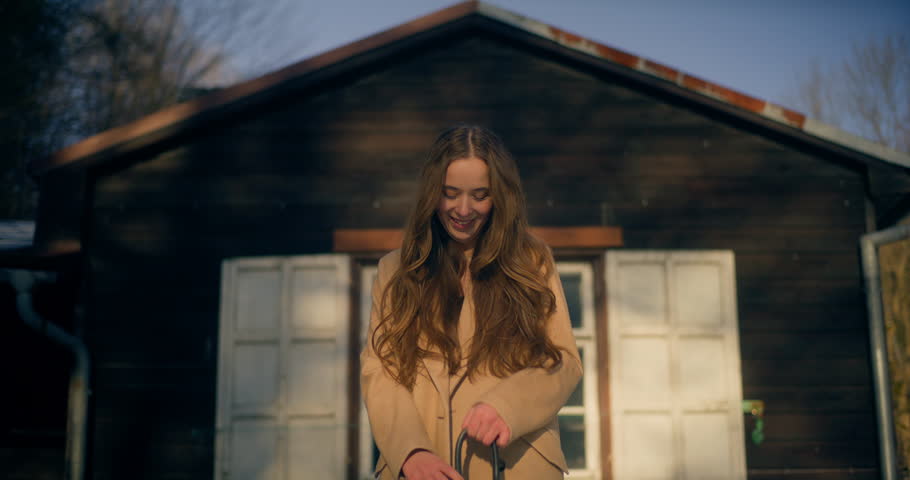 Female Tourist Walking In Mountains In Winter On a Sunny Day