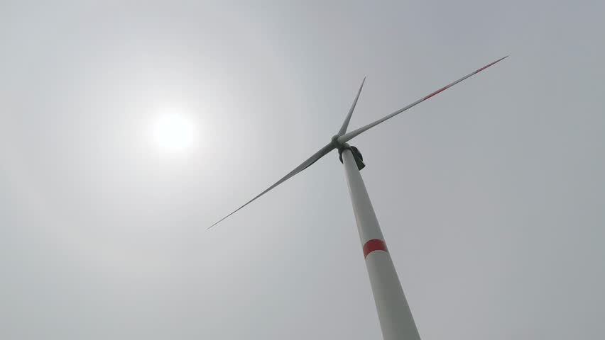 Rotating wind turbine blades from below | Shutterstock HD Video #1101550269
