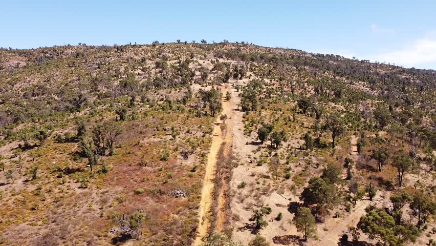 Aerial View Moving Towards Outback Hillside With Hiking Trail, Perth Australia