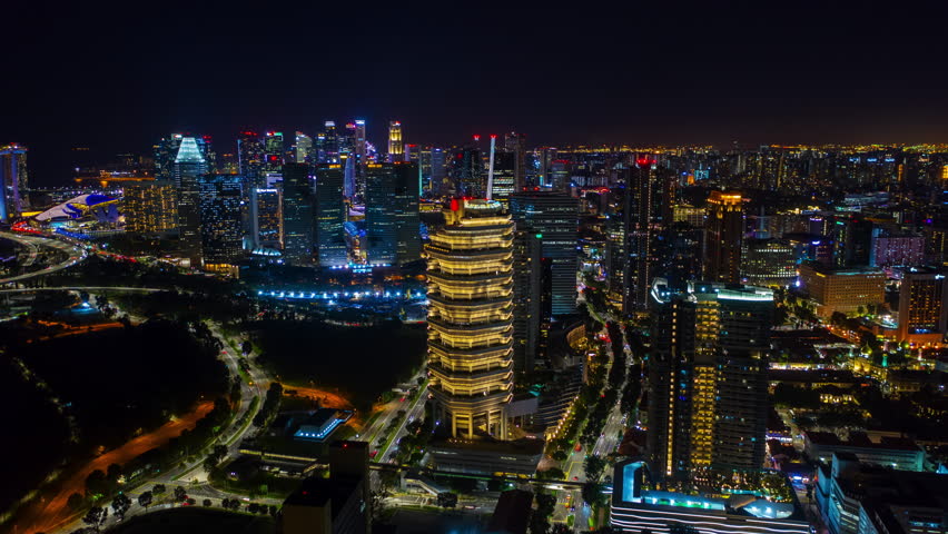 night time illumination sinagpore city center downtown district aerial timelapse panorama 4k