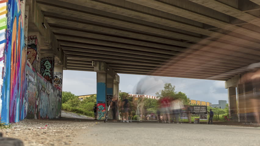 Timelapes of Large Crowds Passing Under an Atlanta Bridge