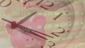 Animation of stock market data and clock over hand of caucasian woman inserting coin in piggybank. Digital composite, multiple exposure, time, savings, investment, finance and accountancy concept, - Powered by Shutterstock - Get 15% off with code: PIKWIZARD15