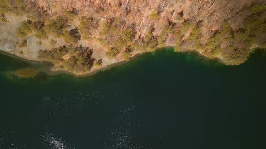 Aerial drone footage of iron ore quarry in Pennsylvania. | Shutterstock HD Video #1101611115