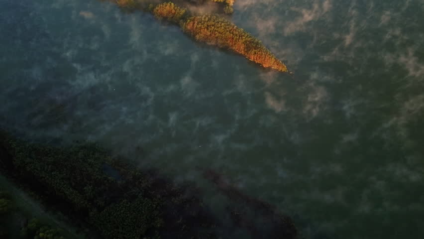 Clouds Reflection With Autumn Forest In Danube River Near Ruse, Bulgaria. Aerial Drone Shot | Shutterstock HD Video #1101611181