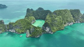 4k Video,Aerial view, High angle view of Koh Hong Lagoon and green-covered gorge in the blue-green sea.Ko hong island lagoon Thailand