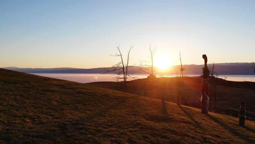 Sunset over Lake Baikal in spring. Olkhon Island.