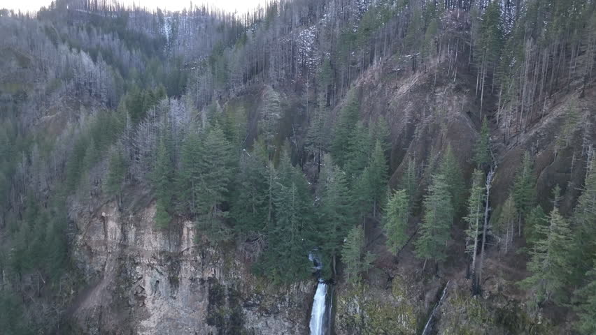 The spectacular Multnomah Falls, over 600 feet high, is located on the Oregon side of the Columbia River Gorge. This magnificent natural wonder is just a 30 minute drive east of Portland. | Shutterstock HD Video #1101621167
