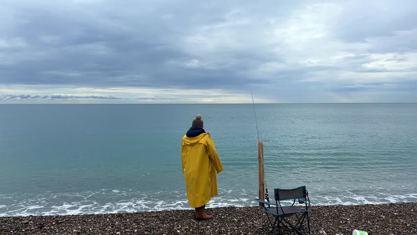 a fisherman on the beach