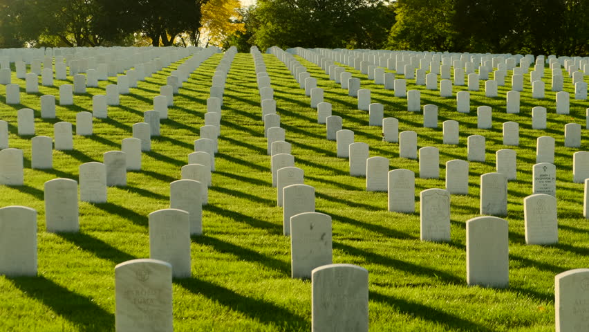 Memorial Day Veteran's Cemetery. Arlington National Cemetery panning shot at sunset. america Christian Cemetery pan, Catholic faith white stone tomb.  Royalty-Free Stock Footage #1101629531
