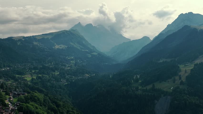 Aerial view of Switzerland mountains in cloudly day. 