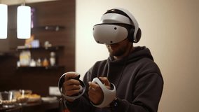 guy playing a game in virtual reality glasses