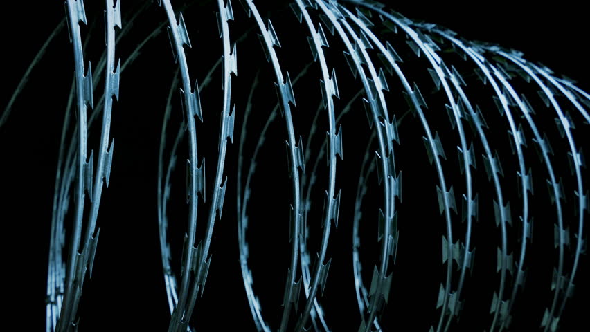 Large Coils Of Razor Wire Closeup