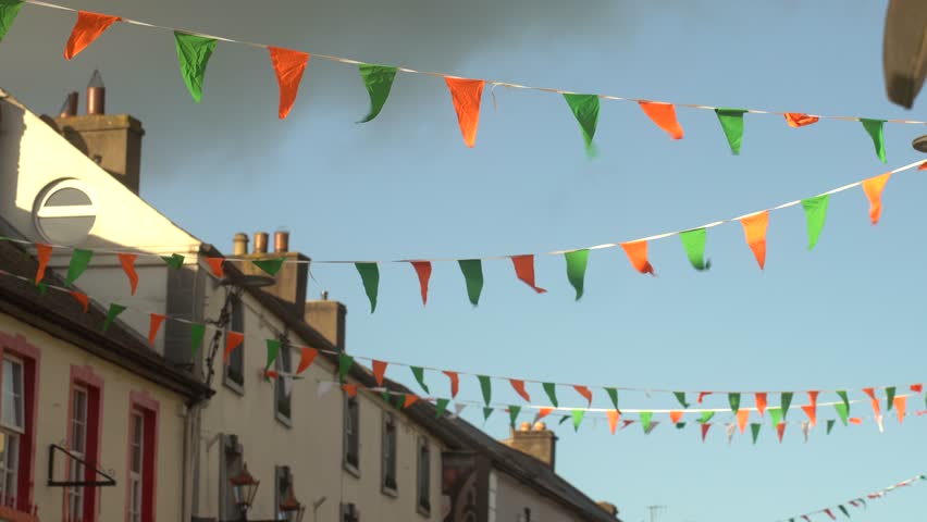 Irish colored flags crossing the street, Ireland 4k