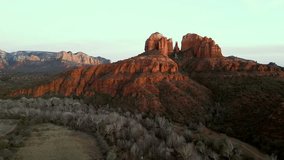 Pulling out reveal of Cathedral Rock in distance Oak Creek canyon in Sedona