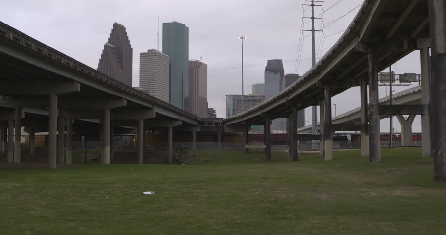 Low angle view of downtown Houston, Texas skyline from under bridge area