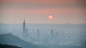 Dynamic Clouds and Urban Scenery: A Video of Taipei's Evening Sky Mesmerizing Taipei Twilight: Orange Skies and Illuminated Cityscape
