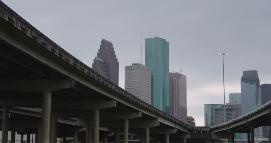 Low angle view of downtown Houston, Texas skyline from under bridge area