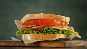 Super slow motion of stacking sandwich pieces. Camera in motion. Filmed on high speed cinema camera, 1000 fps. Placed on high speed cine bot. Speed ramp effect. - Powered by Shutterstock - Get 15% off with code: PIKWIZARD15