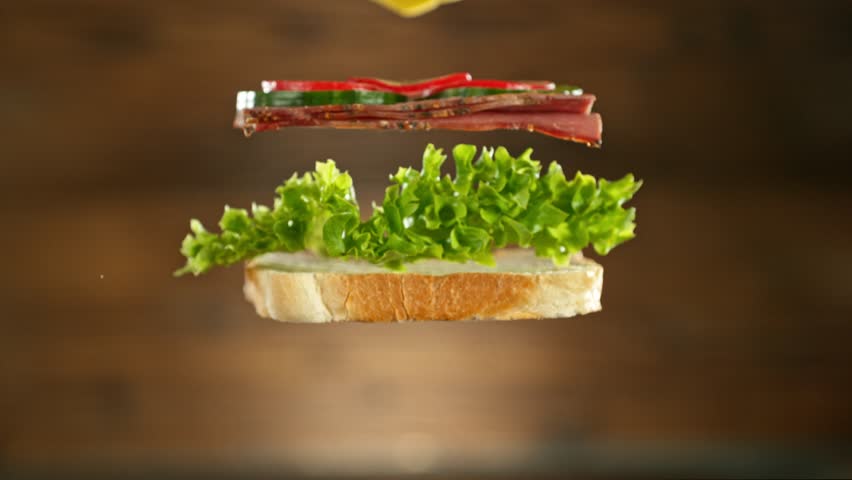 Super slow motion of stacking sandwich pieces. Camera in motion. Filmed on high speed cinema camera, 1000 fps. Placed on high speed cine bot. Royalty-Free Stock Footage #1101654109