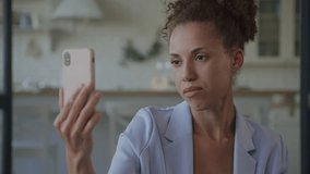 Businesswoman talking video call using smartphone