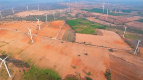 Wind turbines offer a sustainable and cost-effective way to produce electricity without emitting harmful pollutants, contributing to a cleaner and more efficient electric energy system. 4K Drone
