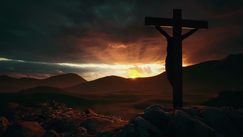 The silhouette of the cross with the crucifixion of Jesus Christ on Mount Calvary against the background of dark clouds and an orange sunset. The concept of the holiday of Easter, Holy Week, resurrect