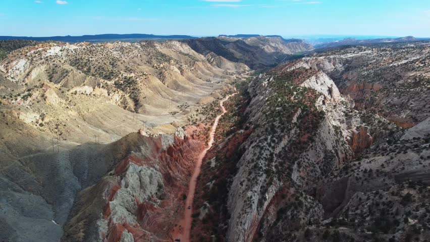 Scenic Drive Through Rocky Canyons In Dinosaur National Monument In Utah, USA. wide aerial