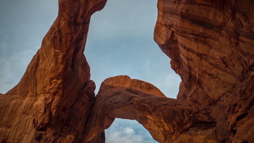 Timelapse, Clouds Moving Above Amazing Natural Arch in Arches National Park, Utah USA
