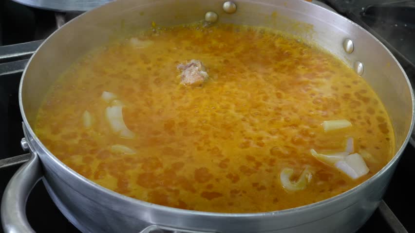 Incorporation of ingredients for a rice with lobster