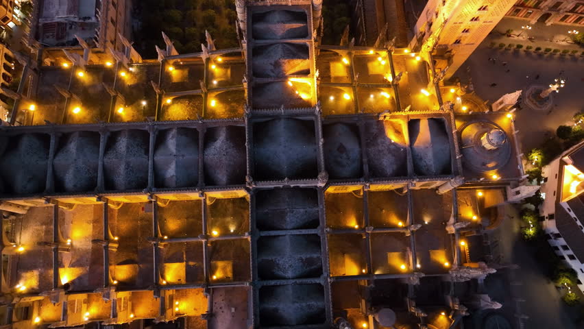 4k Aerial shot of Seville with gothic cathedral and famous Giralda bell tower. Seville, Spain.