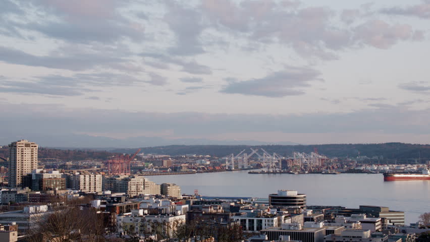 Wide Pan of Seattle Harbor and Skyline at Sunset. Scenic View of Cityscape from Popular Photography Destination Kerry Park