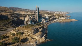 Aerial 4K video from drone to Penon del Cuervo beach, The Rock of the Raven and Playa la Fabrica cement factory. Malaga, Costa del sol, Andalucia ,Spain (series)