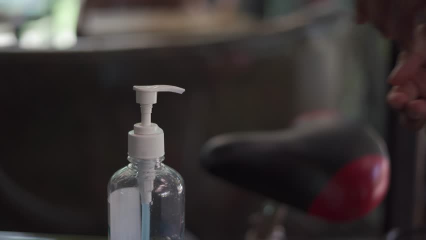 Presentation of gel hand wash prevent and protect from covid-19 in modern and new normal life style, a healthy strong man hand prepare sanitize to avoid from disease, showing liquid washing method. | Shutterstock HD Video #1101695945
