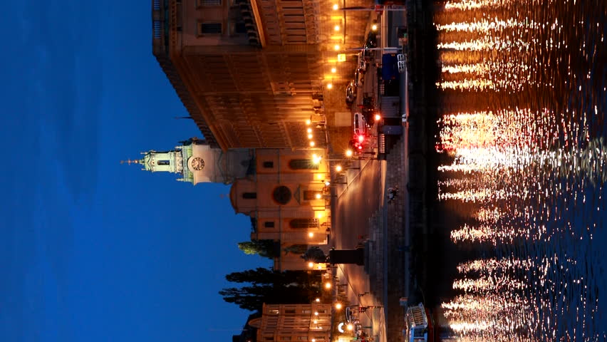 Stockholm, Sweden. Scenic Night View Of Embankment In Old Town Of Stockholm. Gamla Stan In Summer Evening. Vertical Footage Video Famous Popular Destination Scenic Place And UNESCO World Heritage Site