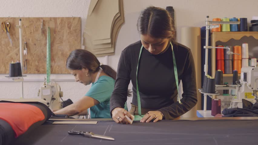 Portrait of a Latin woman in an artisan sewing workshop. Royalty-Free Stock Footage #1101712145