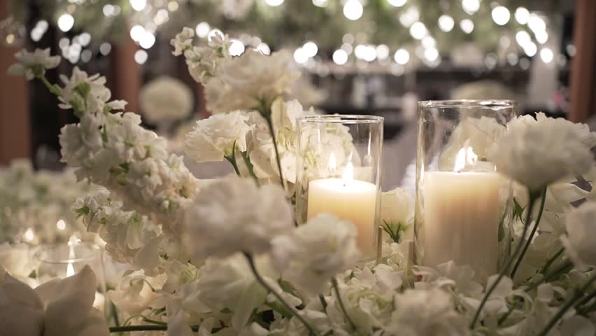 Close up Candlelight bright decoration romantic setting table dinner. Wedding decor candle catering dinner luxury event. no people, copy space   | Shutterstock HD Video #1101715669
