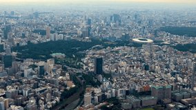 Aerial view of Shinjuku, Tokyo, Japan with a view of Japan national Stadium