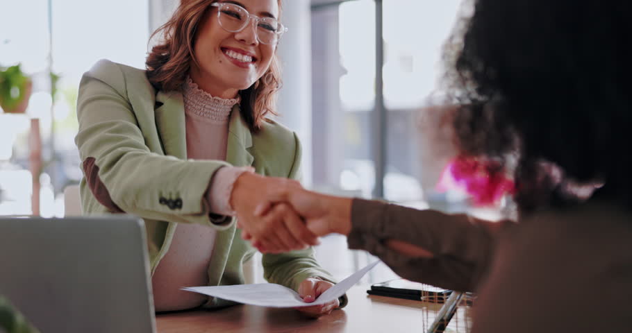 Business woman, interview and handshake in meeting for corporate growth, skills or recruitment at office. Happy female employee shaking hands of candidate in hire process for new recruit at workplace | Shutterstock HD Video #1101731467