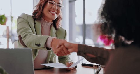 Business woman, interview and handshake in meeting for corporate growth, skills or recruitment at office. Happy female employee shaking hands of candidate in hire process for new recruit at workplace – Video có sẵn