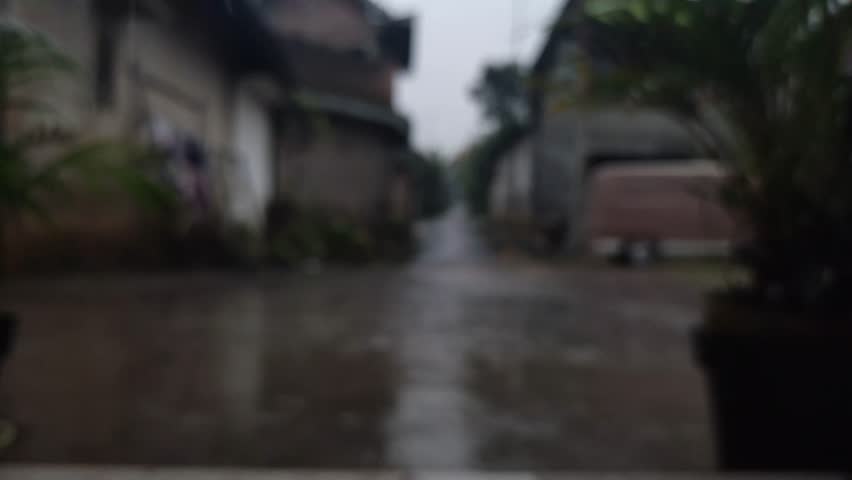 Defocused video of raindrops falling on the ground, 4k video | Shutterstock HD Video #1101738573