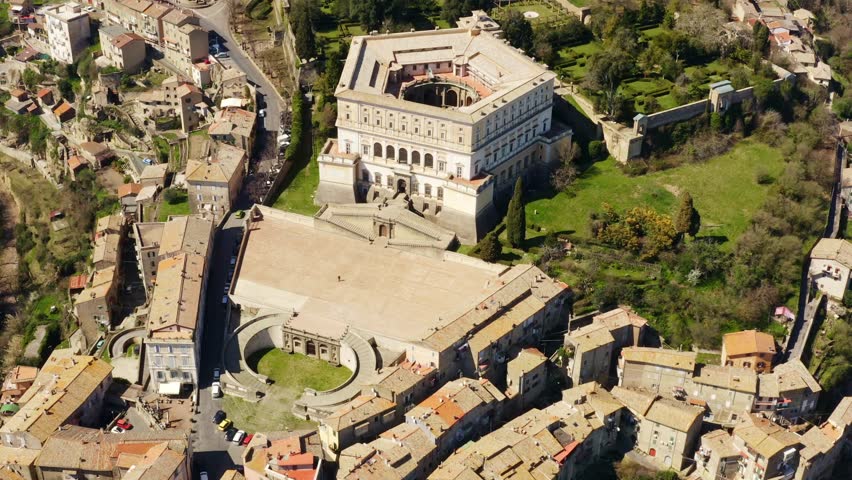 Aerial view of the Villa Farnese, a pentagonal mansion in Caprarola, near Viterbo, Italy. It is a massive Renaissance and Mannerist construction. It is built on a five-sided plan in reddish gold stone