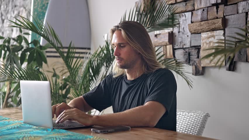 American freelancer cell office cafe. Busy person use computer macbook coworking place. Boss man look screen monitor. People study iphon. Male user start up laptop desk. Freelance guy job home space.