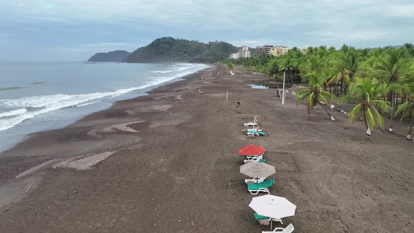 From above, Jaco Beach in Costa Rica is a stunning sight: white sands, blue waters, and lush greenery lining the shore.