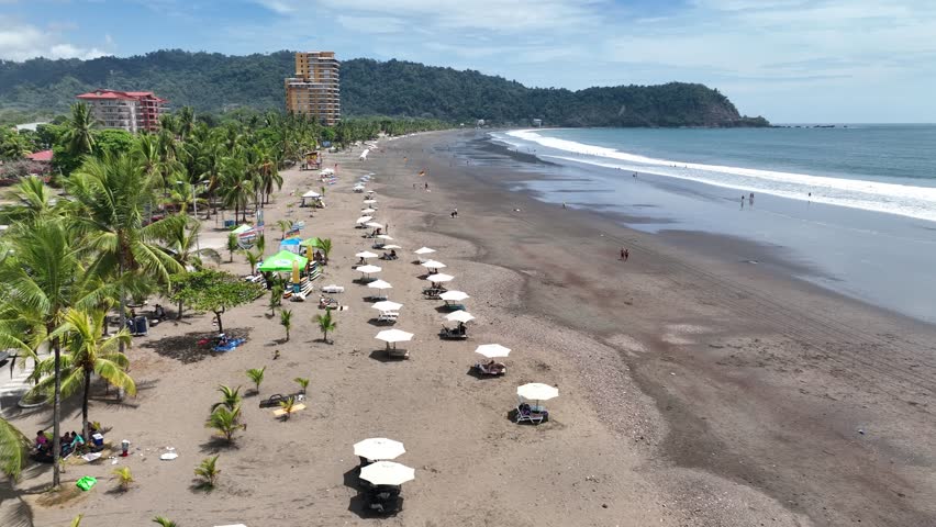 From above, Jaco Beach in Costa Rica is a stunning sight: white sands, blue waters, and lush greenery lining the shore.