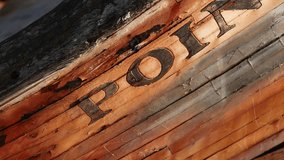 Panning Video of Point Reyes Name on Aged Wood of Historical Shipwreck